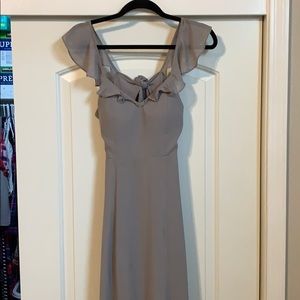 Floor length bridesmaid dress.